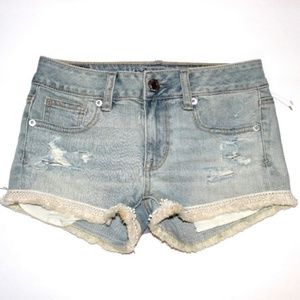 American Eagle Distressed Shortie Shorts Size 00 Light Wash Denim Lace Fringe